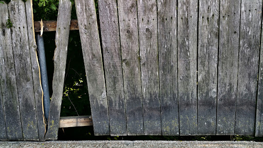Old and damaged wood fence